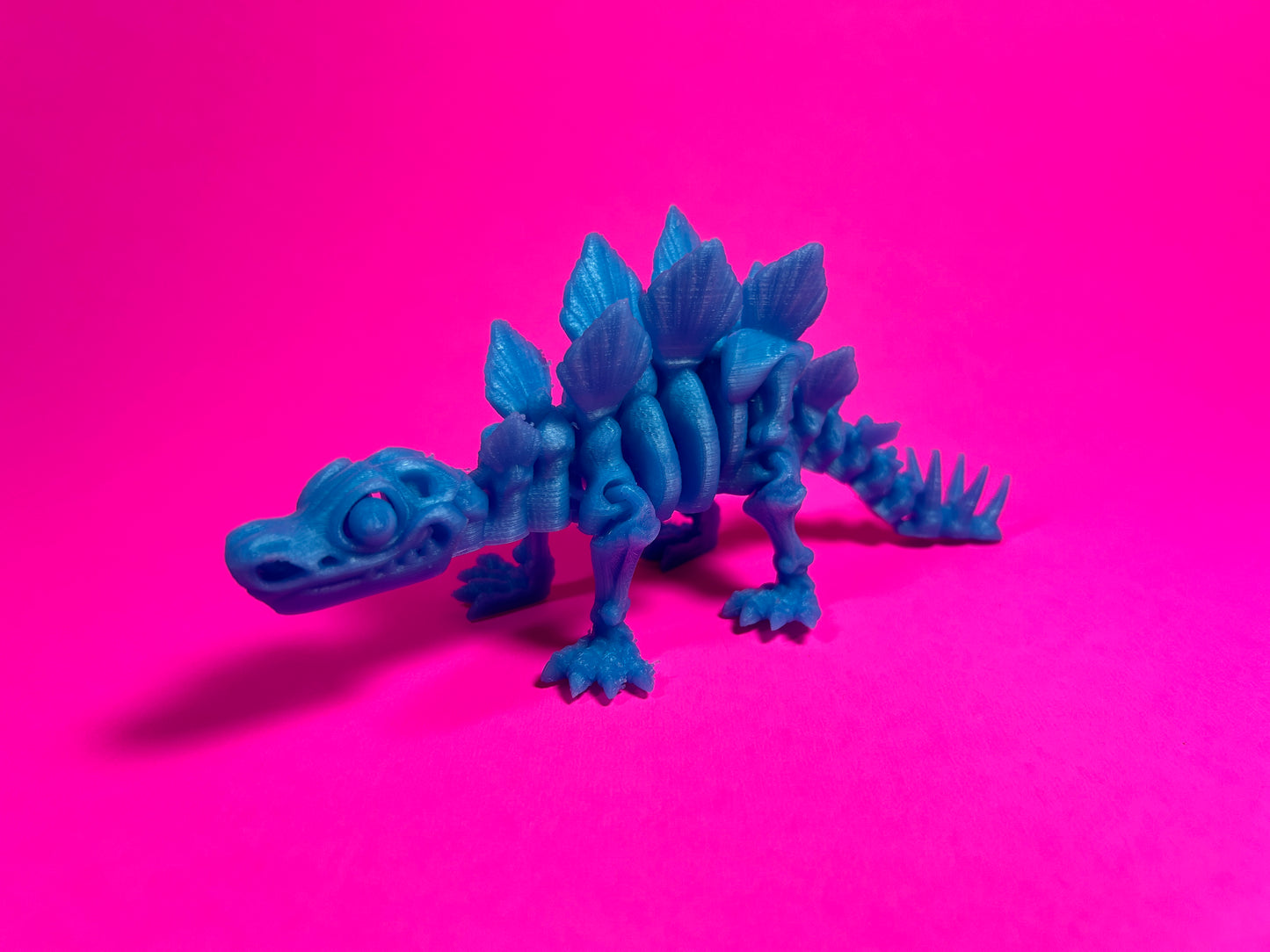 Flexi 3D Printed Stegosaurus Dinosaur Fossil Fidget Sensory Toy Desk Gift - Skeleton - Multicolor - Articulated Glow in the Dark - Flexi Factory